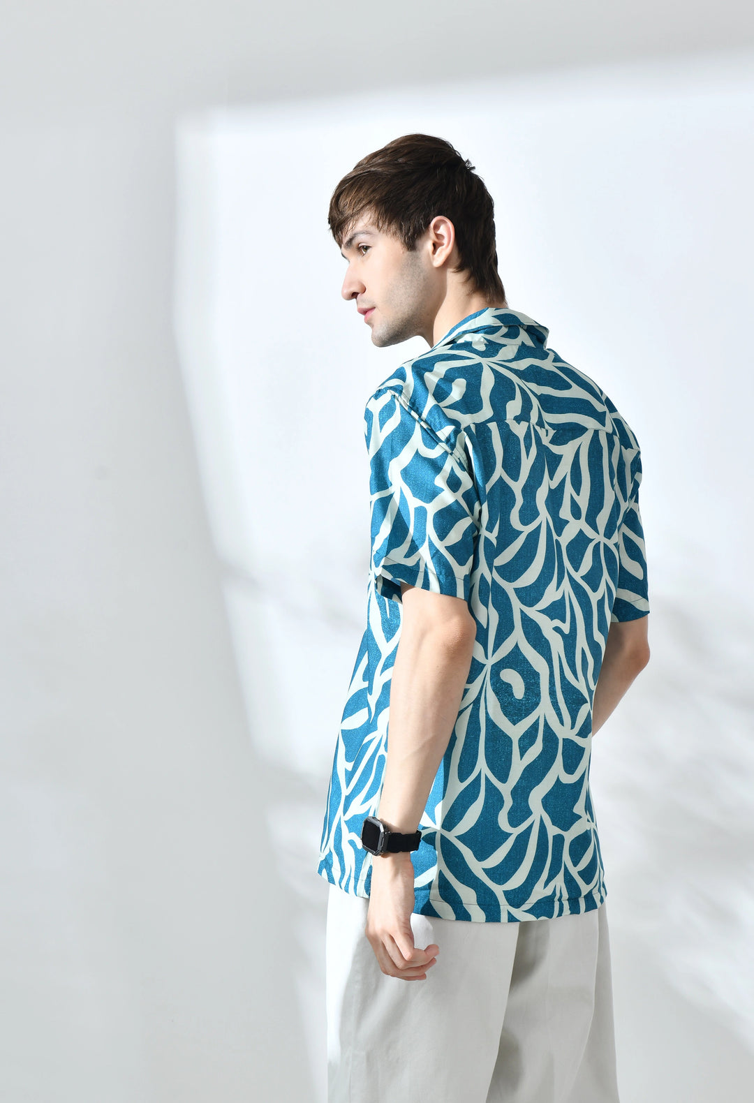 Green abstract printed half sleeve shirt