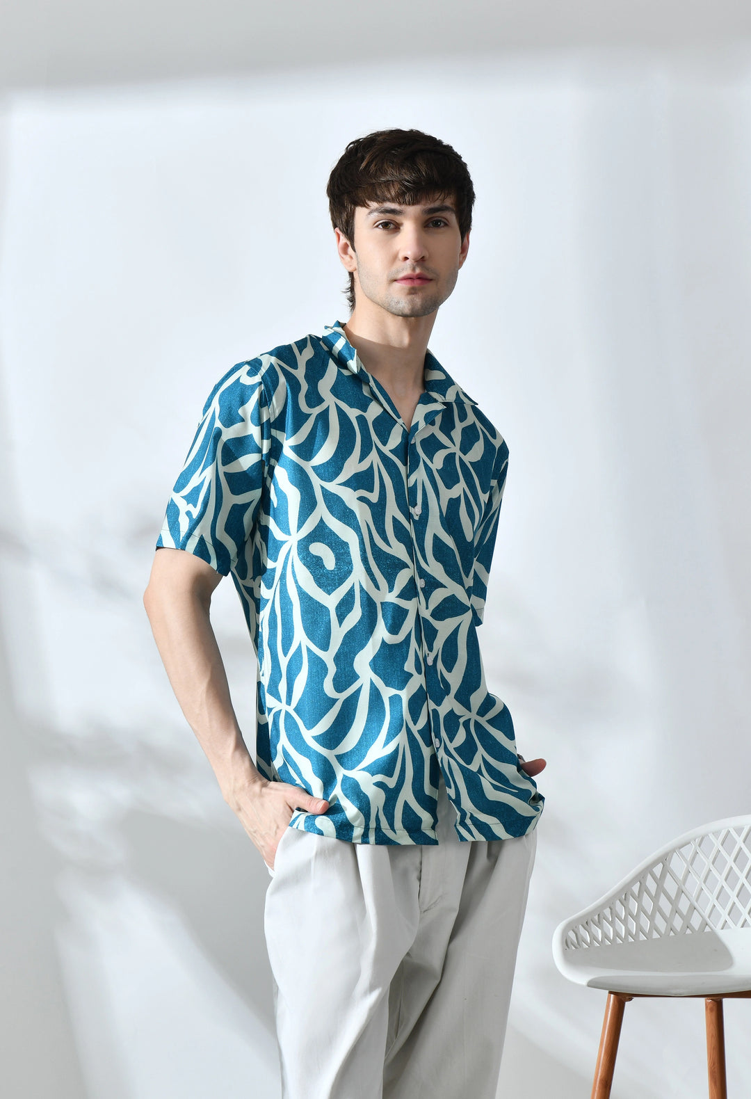 Green abstract printed half sleeve shirt