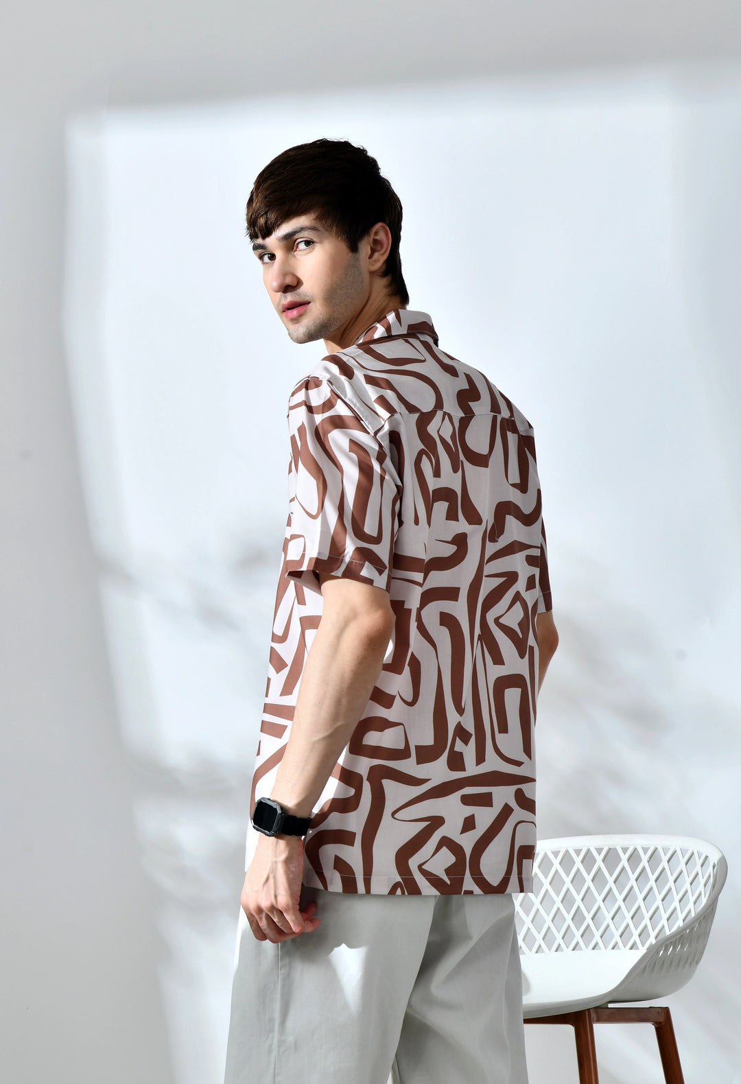 Beige abstract printed half sleeve shirt