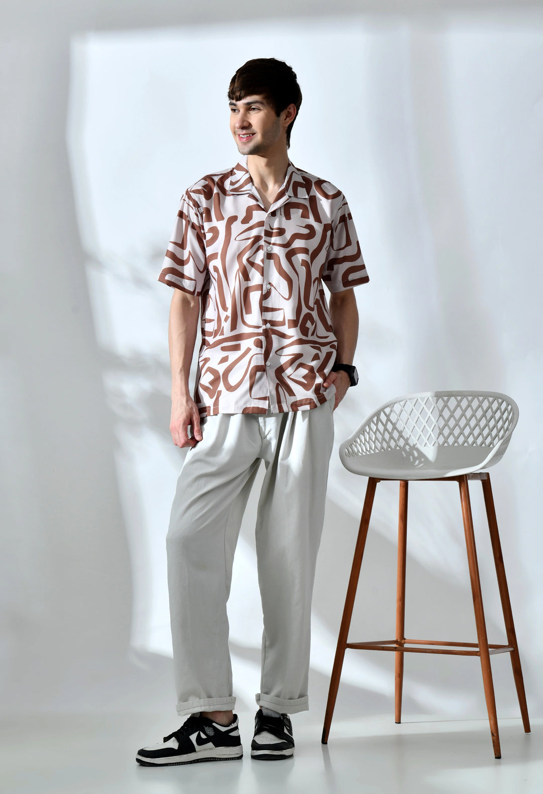 Beige abstract printed half sleeve shirt