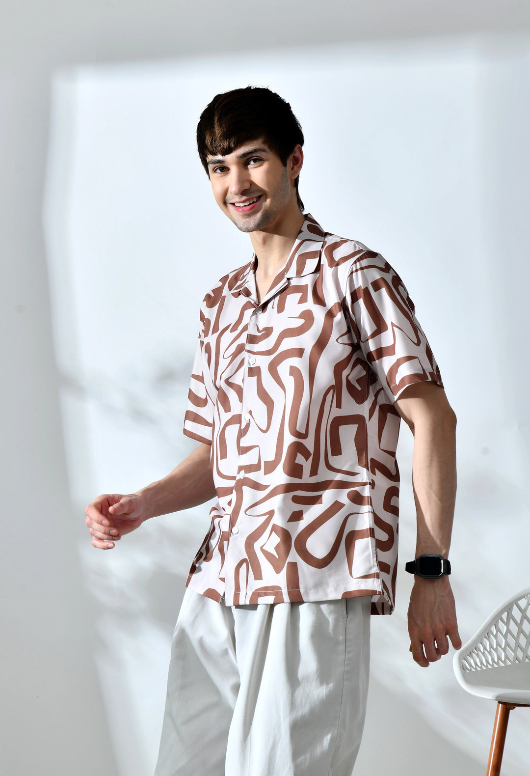 Beige abstract printed half sleeve shirt