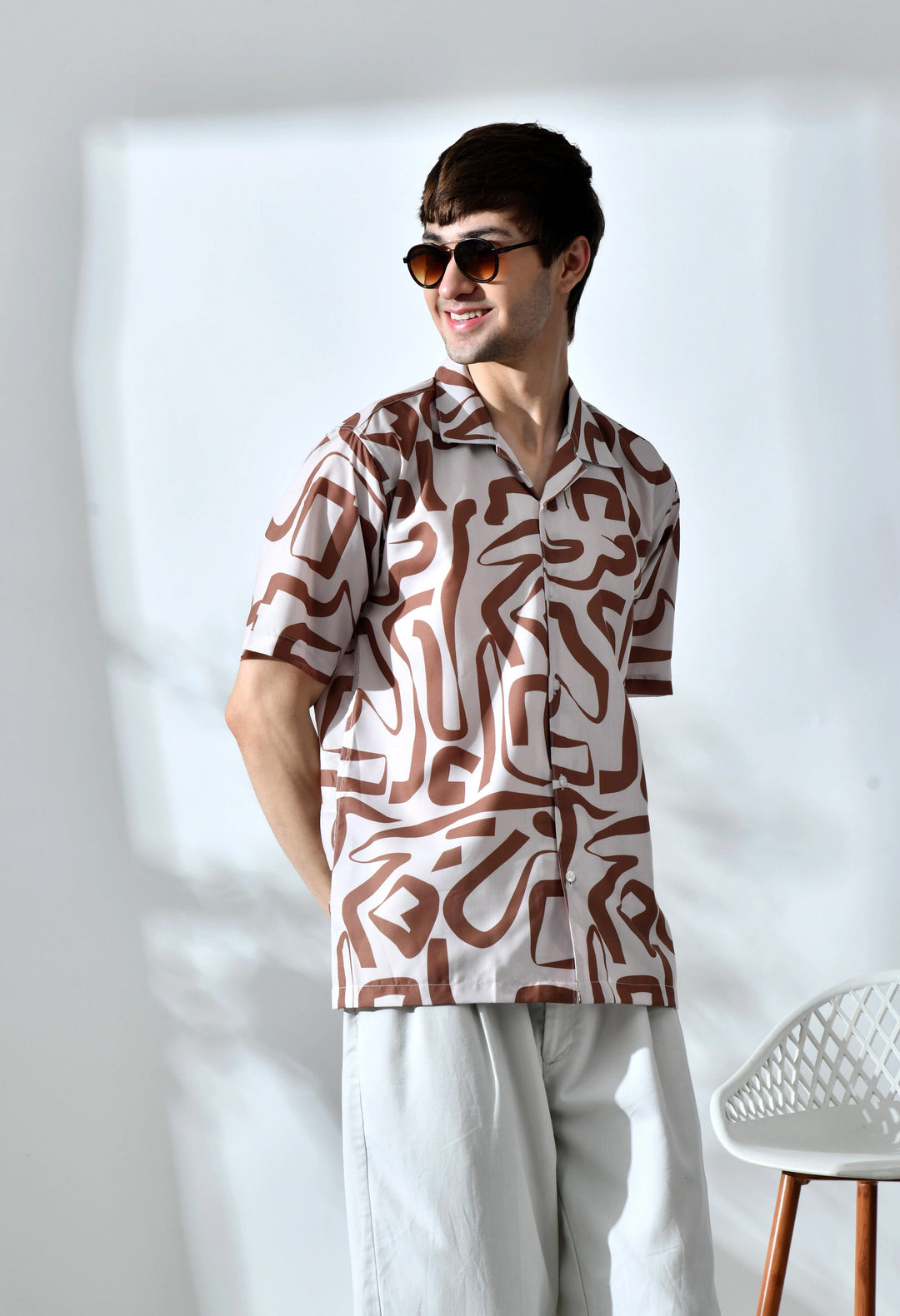 Beige abstract printed half sleeve shirt