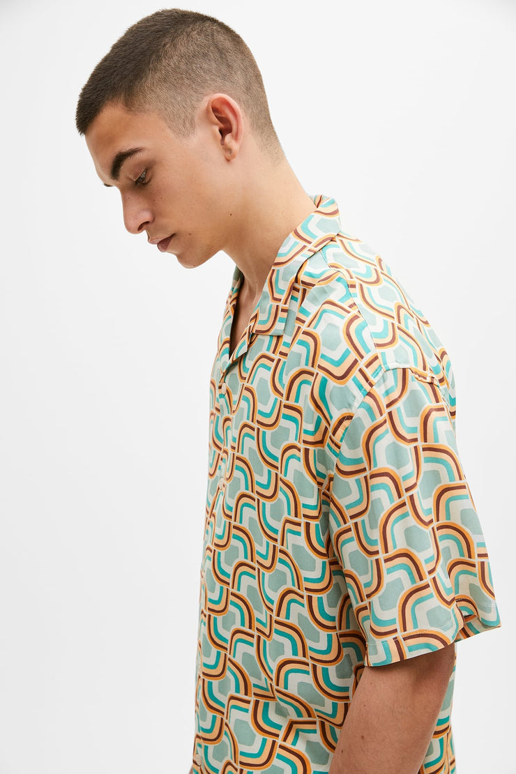 Sea blue geometric design half sleeve shirt for men